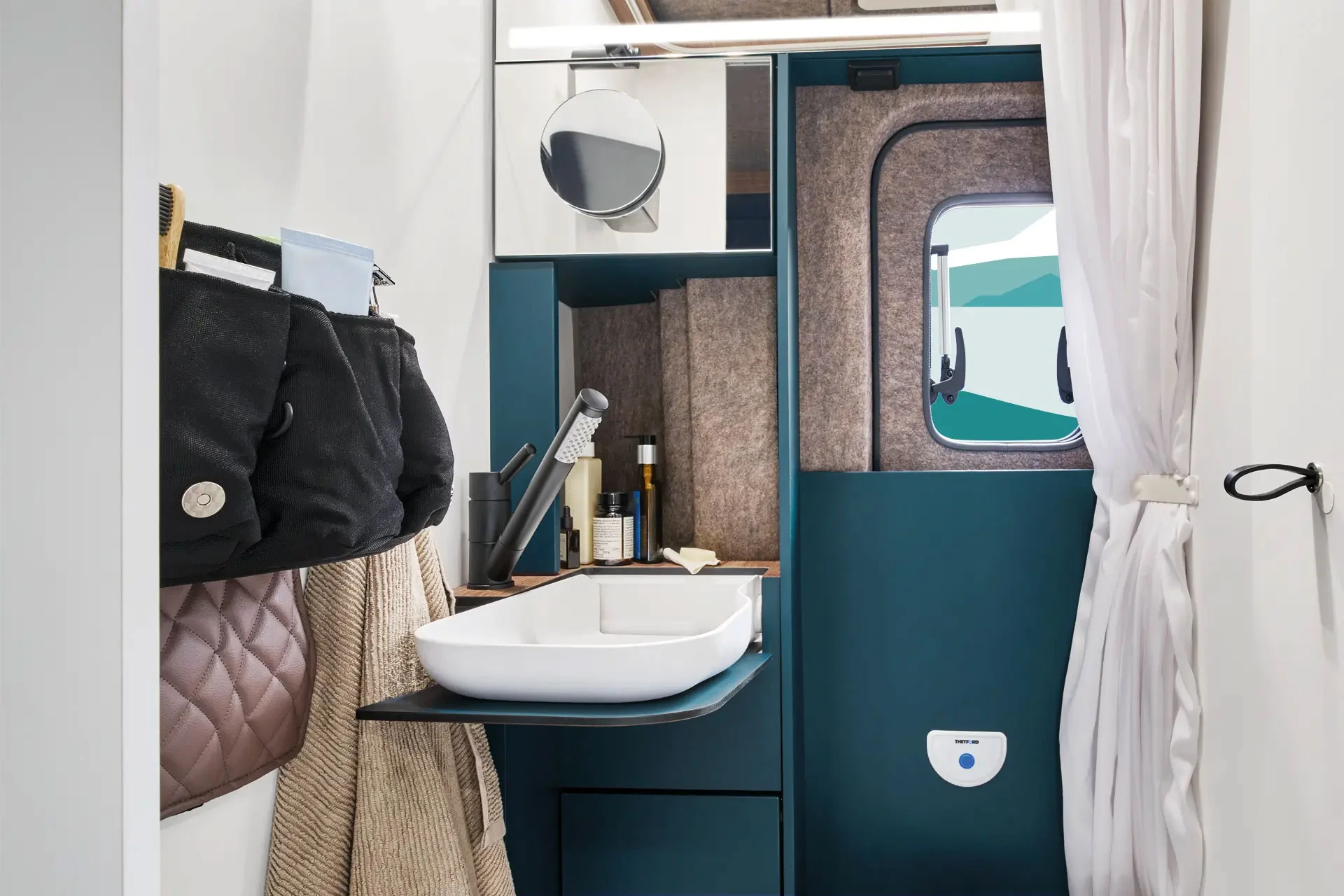The fold-down sink creates space exactly when it's needed.