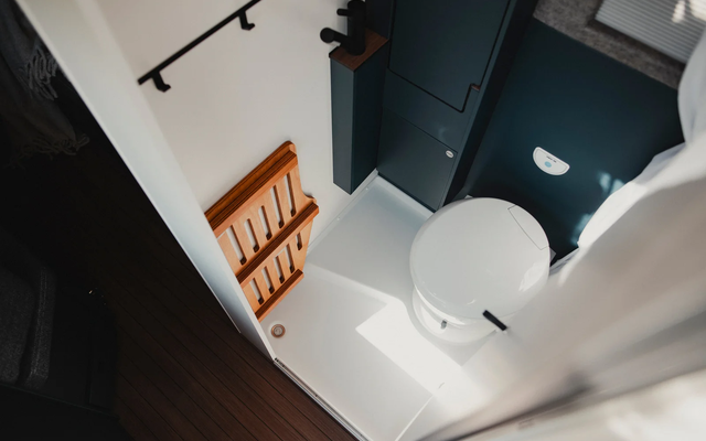 Comfort in a compact space: toilet, sink and shower. The shower tray provides comfortable walking space in the bathroom when the shower is not in use.