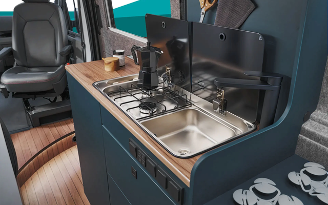 The two-burner hob and integrated sink offer perfect functionality in a compact space.