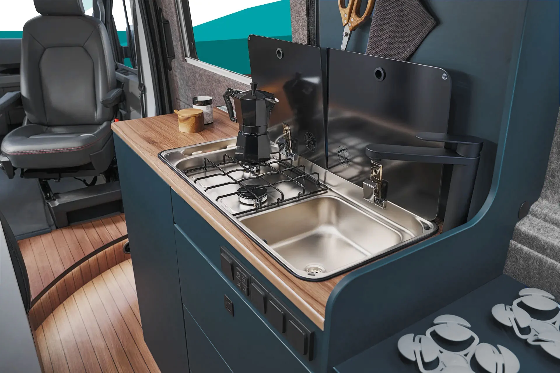 The two-burner hob and integrated sink offer perfect functionality in a compact space.
