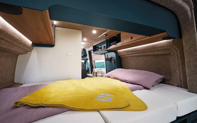 The rear transverse bed in the ERIBA Car 600 offers comfortable sleeping in a compact space.