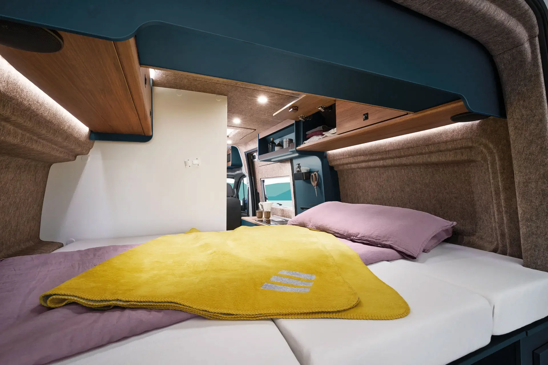 The rear transverse bed in the ERIBA Car 600 offers comfortable sleeping in a compact space.