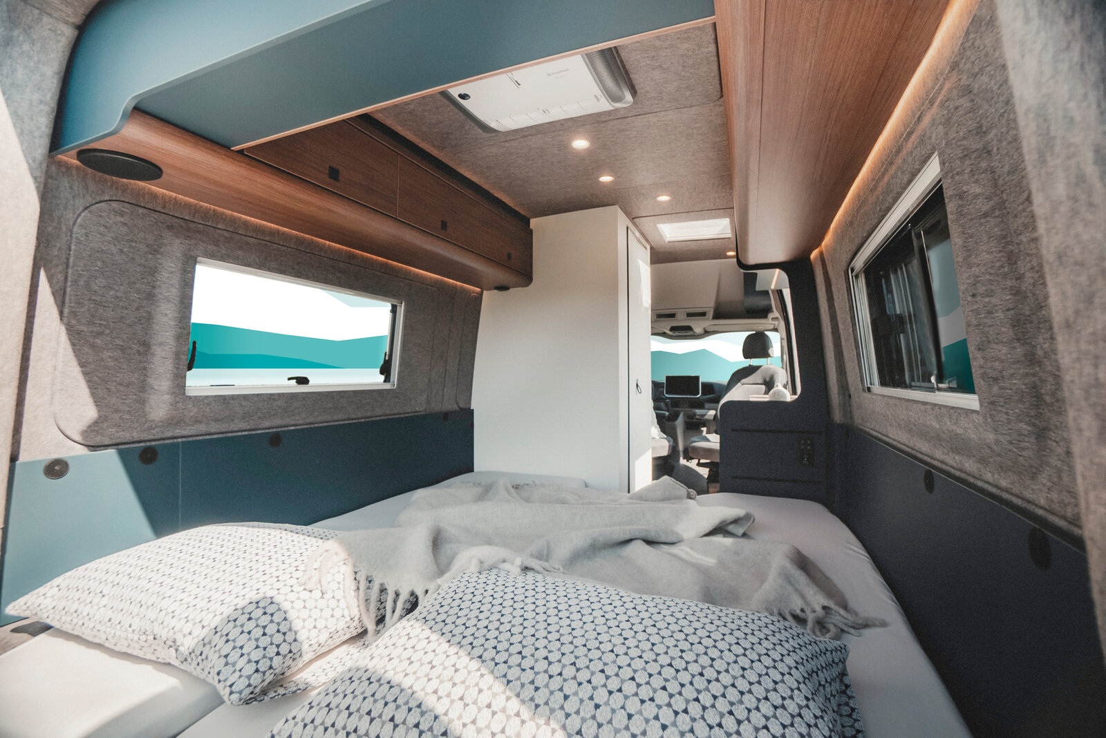 The beautiful view from the bed of the ERIBA Car 602 offers a harmonious view into the spacious interior.